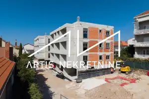 Exclusive residential development: two modern buildings, located just 200 meters from Višnjik Sports Center! Completion scheduled for May 10, 2027.